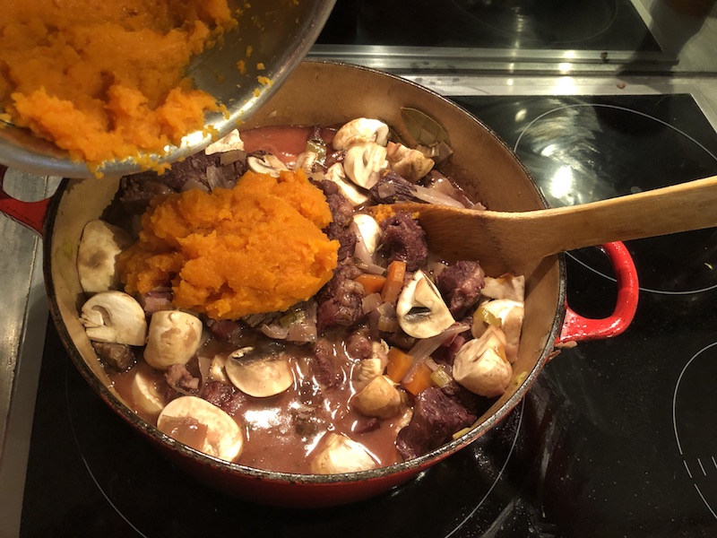 Adding puree and mushrooms